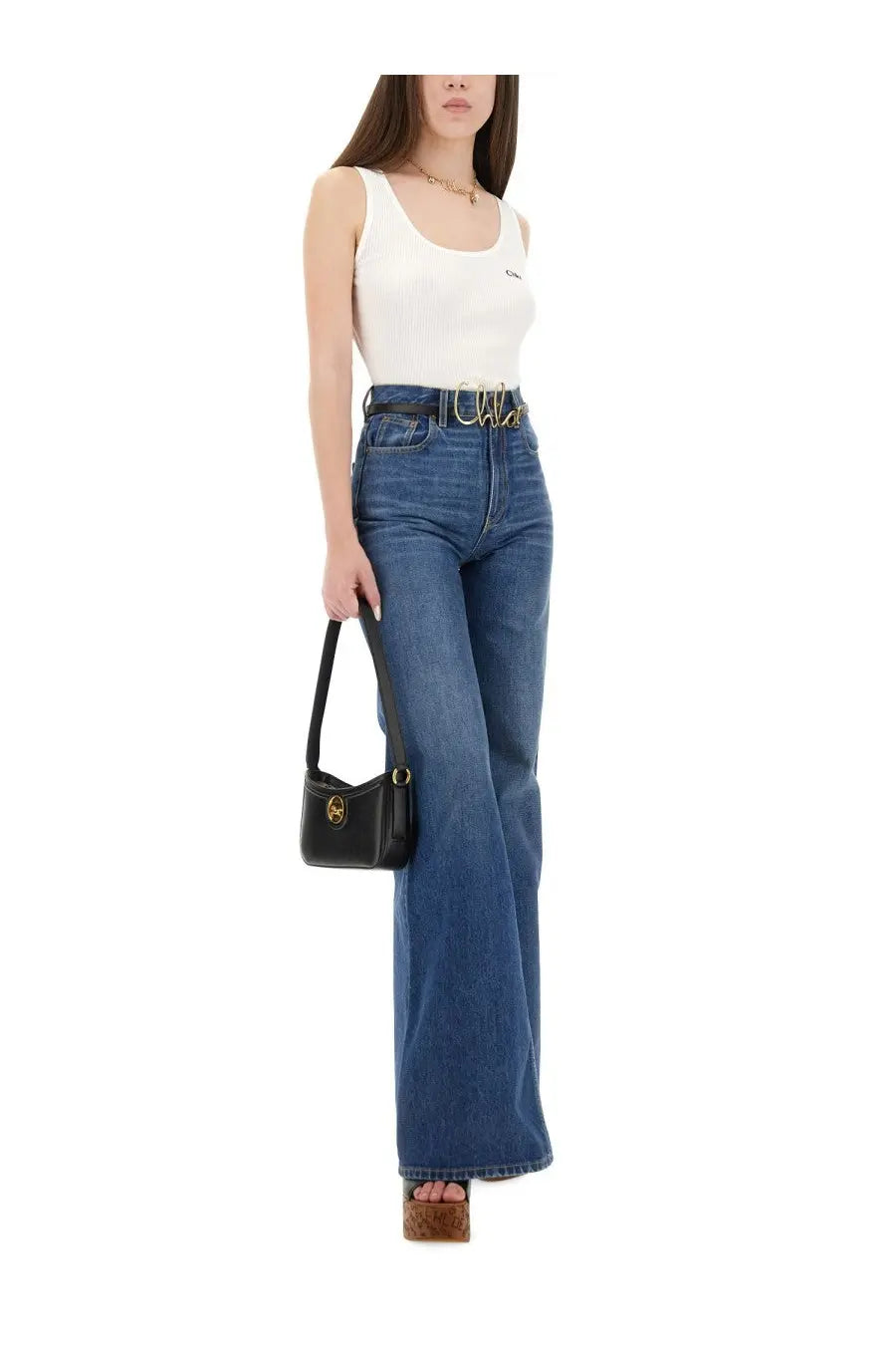 Black leather mini handbag with gold-tone logo clasp complementing chloé women’s white tank top