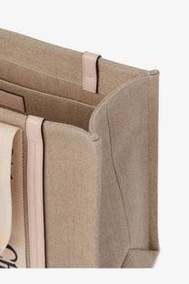 Beige canvas tote bag with light pink leather handles and trim in chloé women’s woody linen shoulder bag blue product image