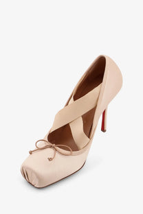 Christian Louboutin women’s Cassia Nodo beige satin high-heeled pump with red sole and crisscross strap detail
