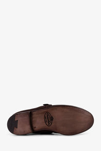 Brown leather monk strap shoe with visible brand emblem on sole from Church’s men’s Shanghai Laser Suede Loafers brown collection