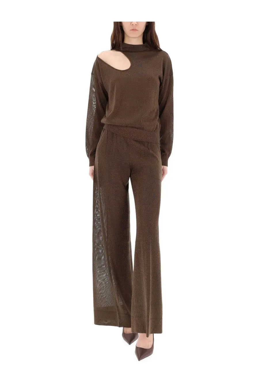 Circus Hotel women’s jersey brown brown knit sweater with cut-out shoulder and sheer mesh sleeves paired with wide-leg trousers