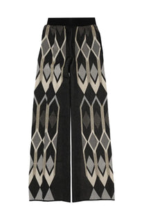 Circus Hotel women’s black wide-leg pants with bold gray and cream geometric pattern and elastic waistband