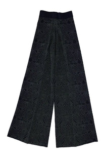 Circus Hotel women’s black wide-leg trousers with a subtle shimmering floral pattern in multicolor fabric