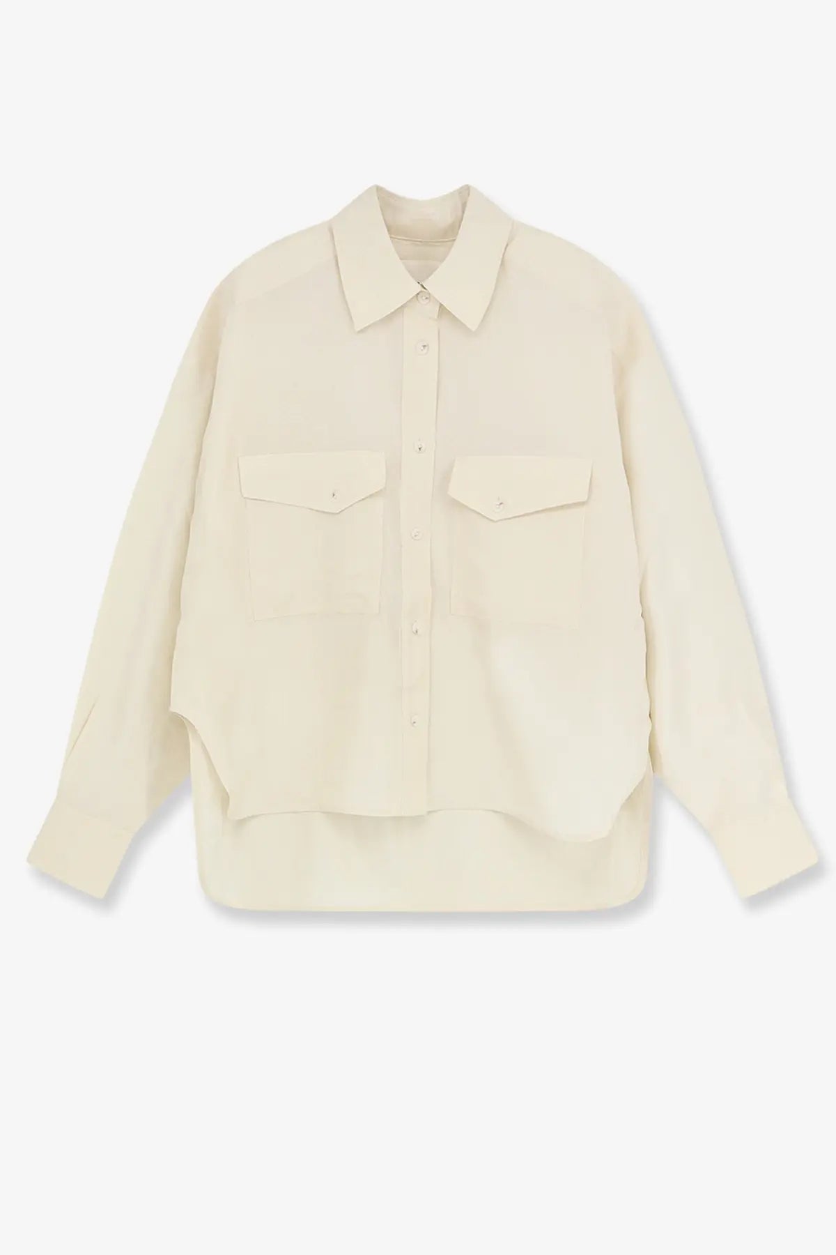Cream-colored long-sleeved cropped silk shirt for women with button-up front, two chest pockets, and asymmetrical hem
