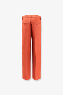 A pair of closed women’s jurdy cotton and linen brown straight-leg chinos with tailored fit and buttoned back pockets shown from the back