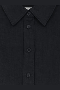Closed women’s linen shirt black featuring textured linen fabric and matching black buttons in a button-up style