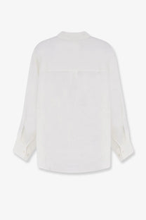 Closed women’s linen shirt white minimalist white blouse with soft flowing silhouette and subtle pleats at the back view