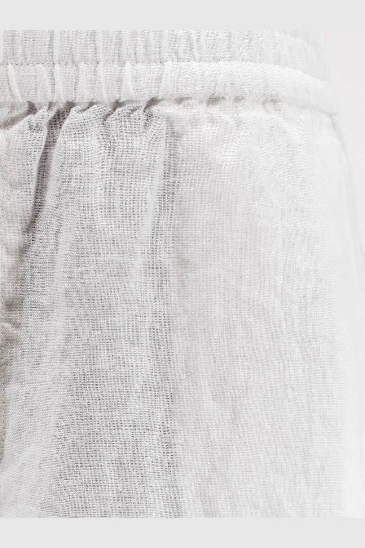 Light gray linen shorts with a soft textured weave and elastic waistband from closed womens linen trousers white collection