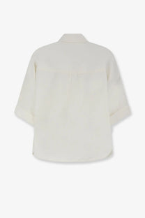 Cream-colored closed women’s linen and viscose shirt with lightweight fabric and rolled-up three-quarter sleeves