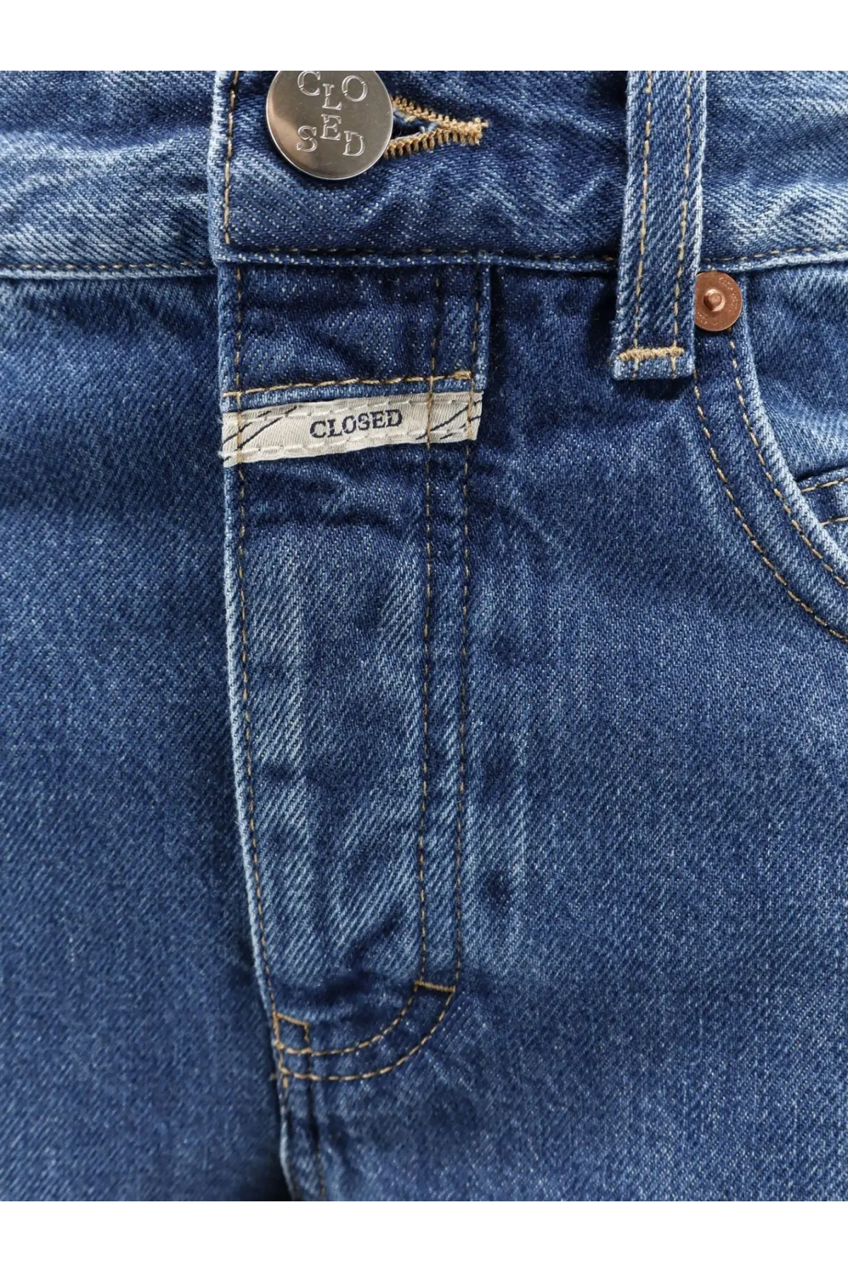 Blue denim jeans for women with silver button and brown stitching from Closed nikka collection