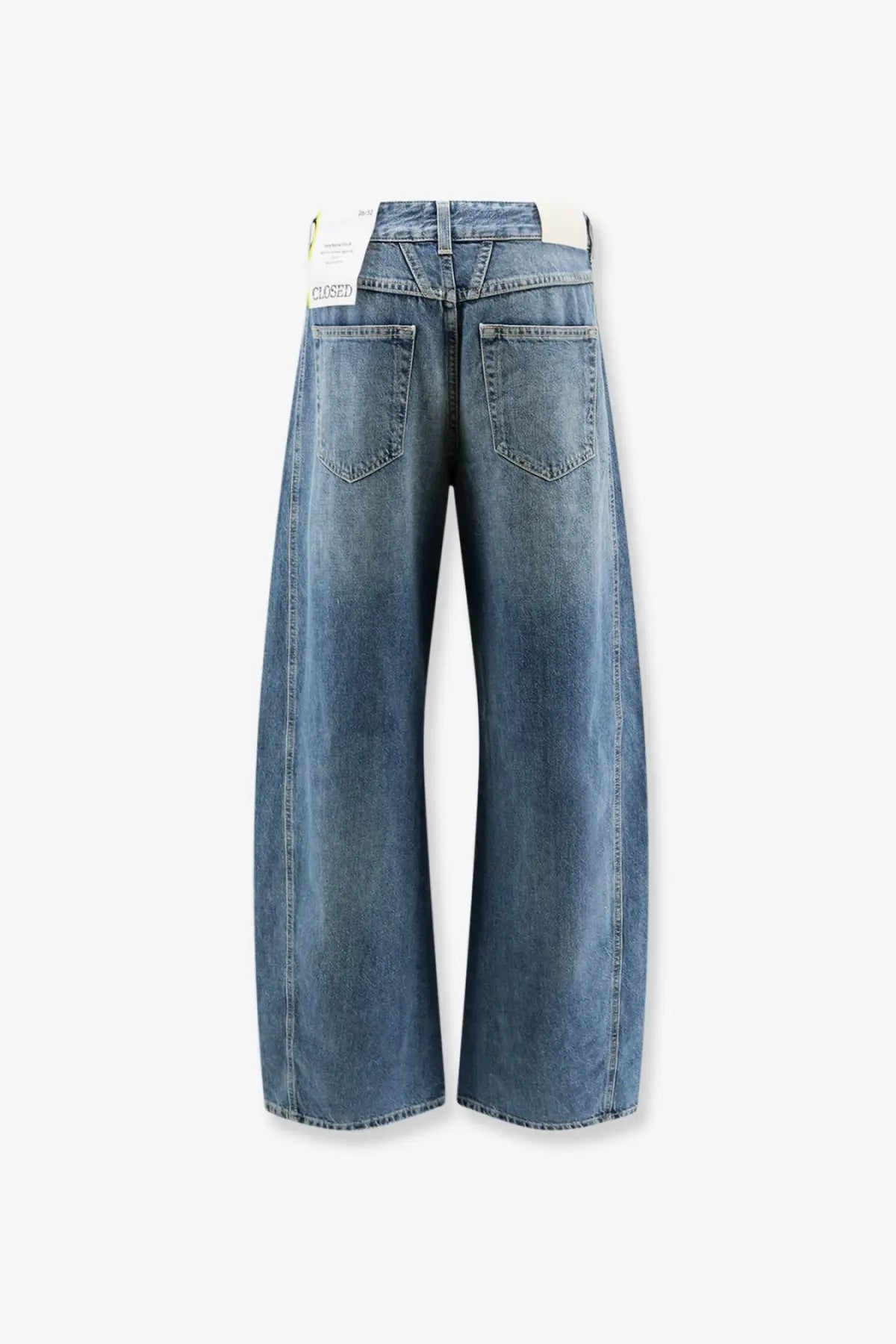 Back view of closed women’s tory blue wide-leg denim jeans in medium-wash blue with classic pockets and white label