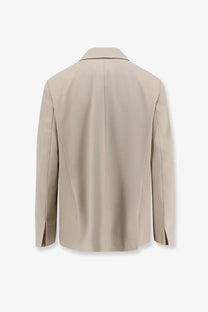 Beige closed women’s virgin wool blend blazer with clean minimalist design and subtle seam detailing
