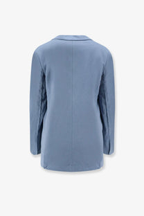 Light blue closed women’s blazer in virgin wool blend with a smooth fabric finish and subtle seam detailing