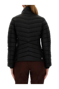 Colmar women’s black down jacket featuring a quilted puffer design with chevron stitching and a high collar