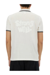 Back of comme des garcons shirt men’s white polo shirt with black trim and bold strong will graphic in white lettering