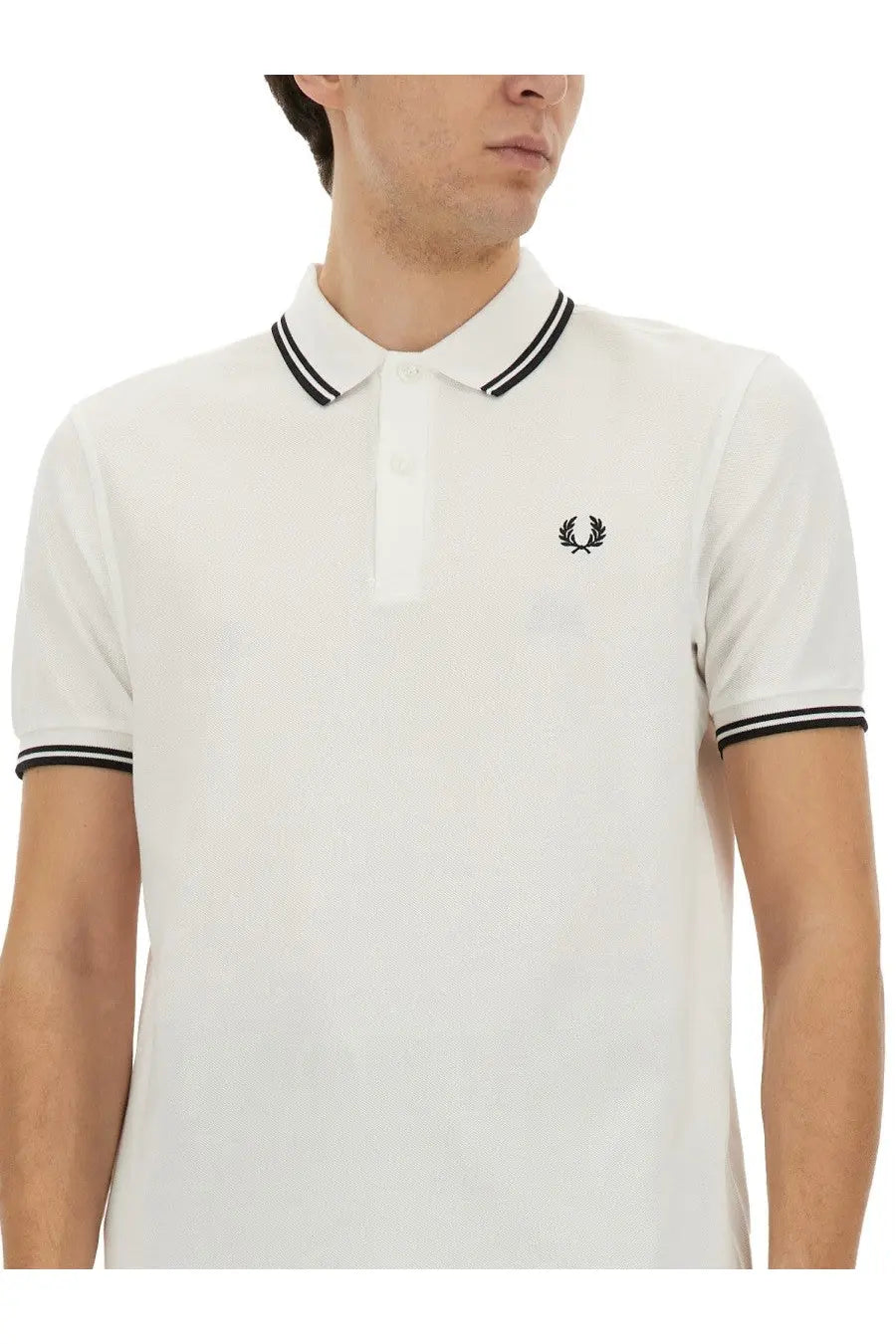 Comme des garcons shirt mens strong will white polo shirt with black trim and embroidered laurel wreath logo