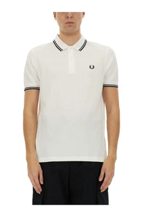 Comme des garcons shirt men’s strong will white polo shirt with black trim and embroidered laurel wreath logo