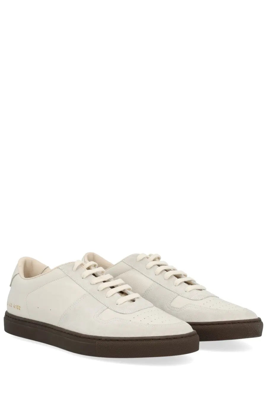 Common Projects men’s bball slim sneaker white cream leather with dark brown rubber sole and perforated toe