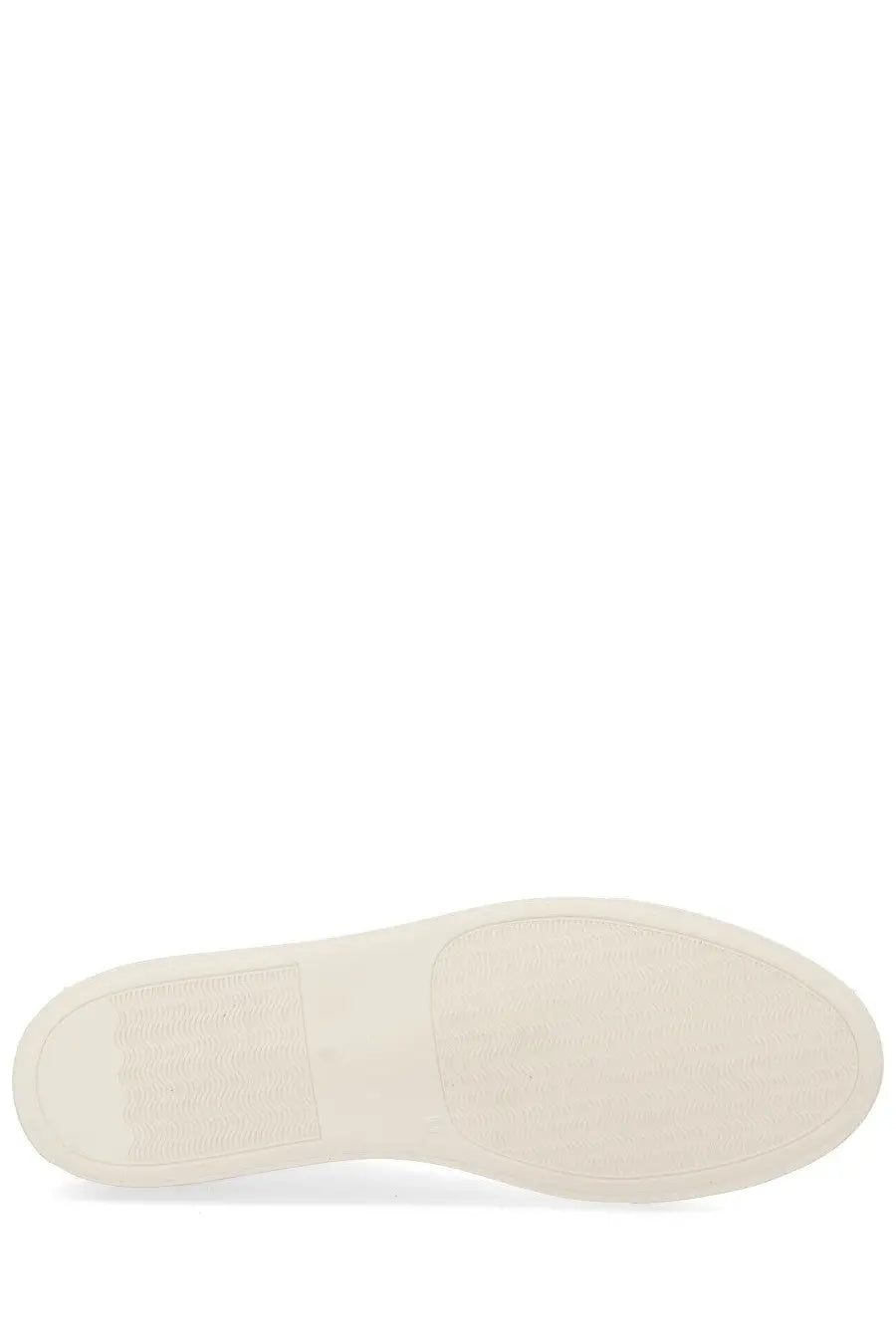 Cream-colored rubber sole with textured grip on common projects men’s sneaker achilles white minimalist design