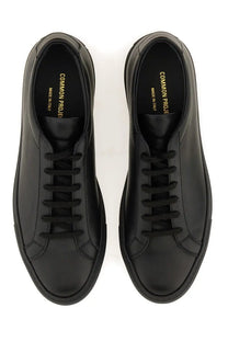 Common Projects men’s sneaker low achilles original black with sleek minimalist black leather and matching black laces