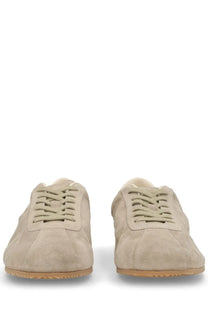 Common projects men’s sneaker in suede beige with low-top design matching laces and tan rubber sole