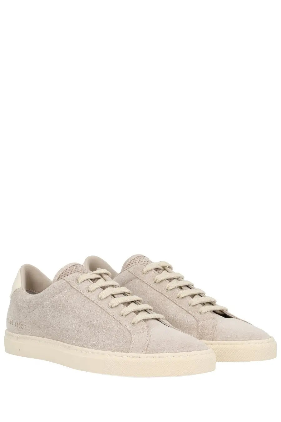 Common projects women’s retro vintage sneaker in beige suede with cream laces and matching rubber sole front view