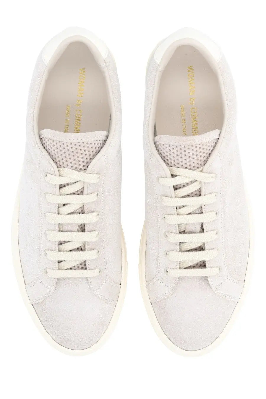 Common Projects women’s retro vintage sneaker white with white suede low-top design and perforated mesh lining