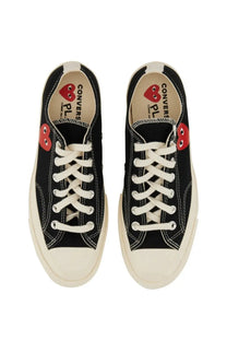 Converse men’s chuck taylor sneaker black canvas with white laces cream sole and red heart-shaped patches on sides