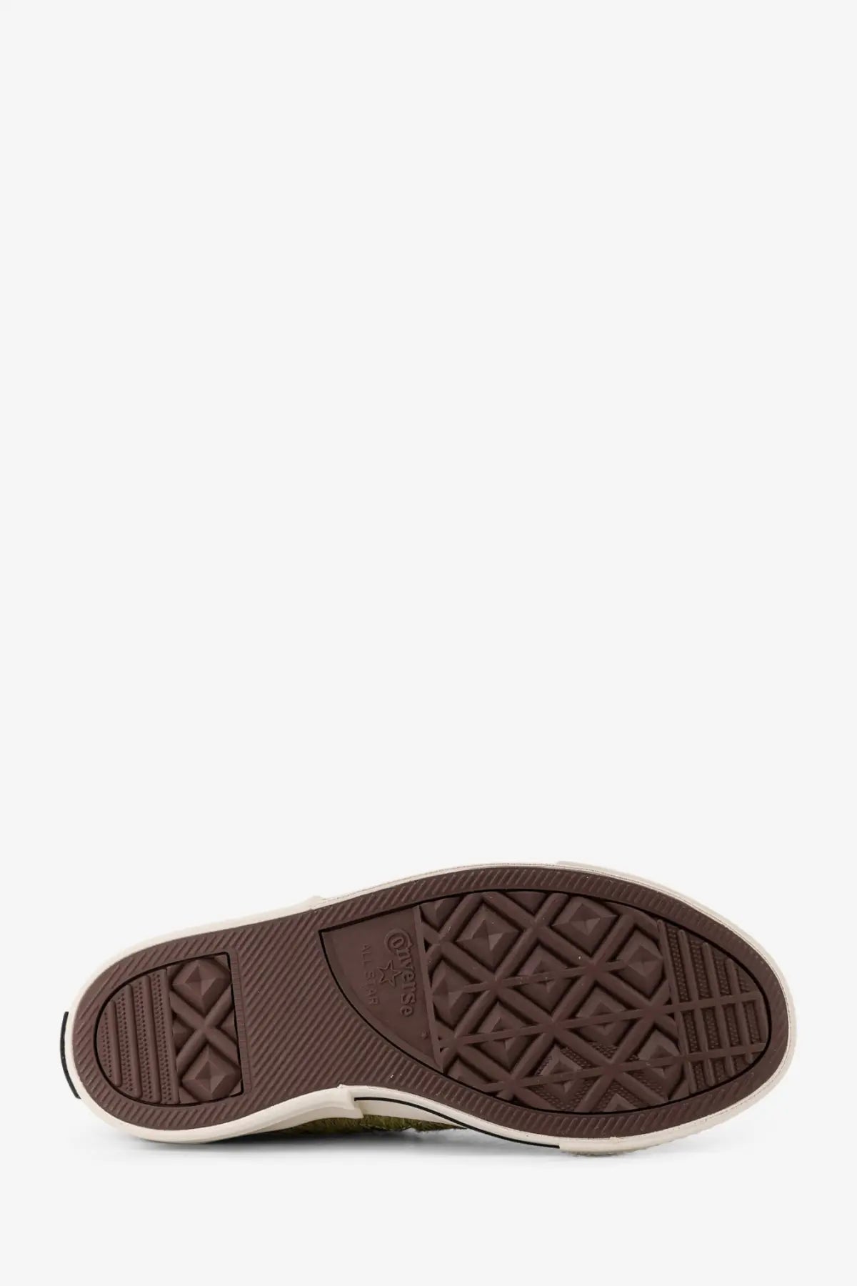 Back view of converse men’s faux fur black sneakers showing brown rubber sole with diamond tread and logo on heel