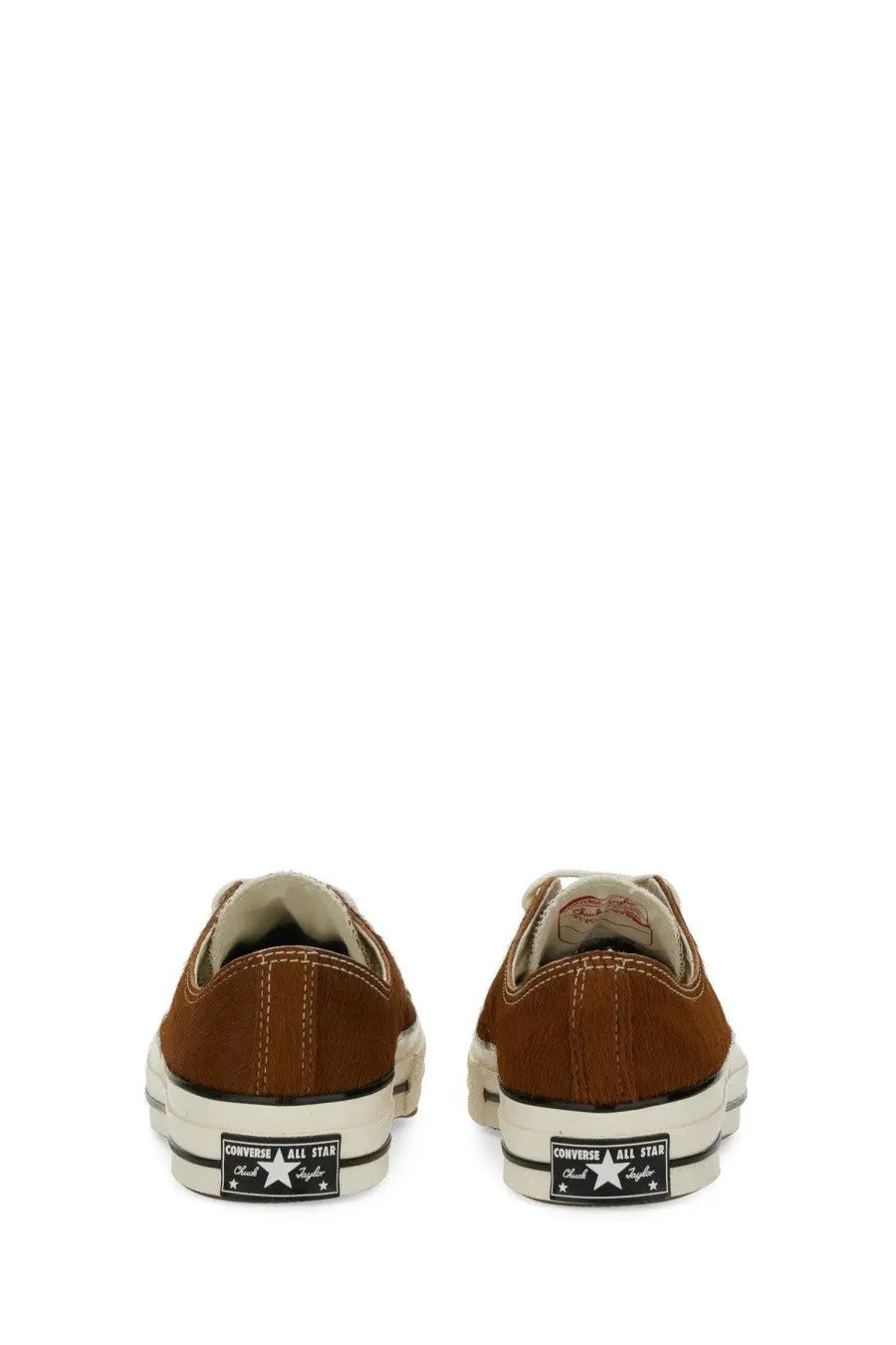 Brown suede converse unisex chuck ox sneaker with white rubber soles and black star logo patches