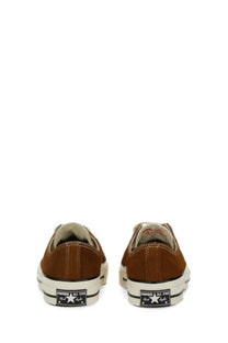 Brown suede converse unisex chuck ox sneaker with white rubber soles and black star logo patches