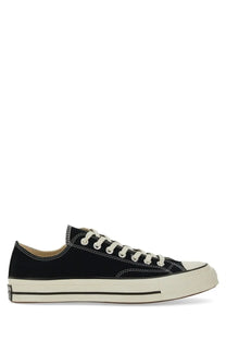Converse unisex chuck sneaker black low-top canvas with white laces and cream rubber sole and toe cap