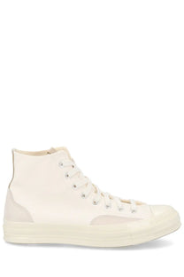 Converse unisex Chuck sneaker white cream-colored high-top with canvas upper rubber sole and tonal stitching details