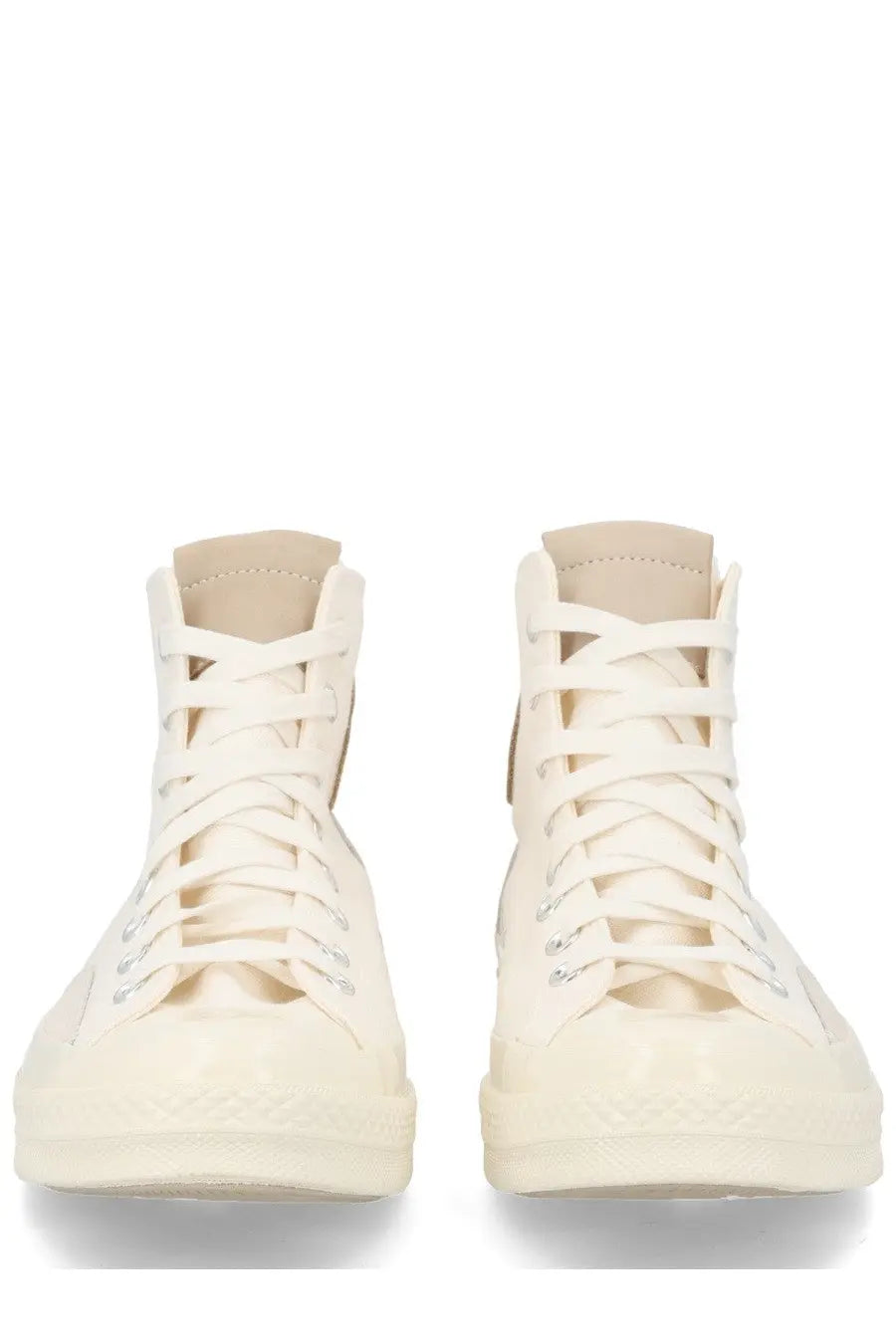 Cream-colored Converse unisex Chuck high-top sneakers with white laces and metallic eyelets for casual wear