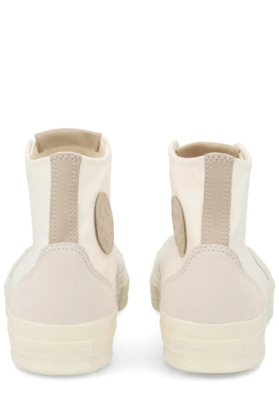 Converse unisex chuck sneaker white cream-colored high-top with minimalist design beige accents and stitched detailing