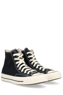 Black high-top Converse unisex Chuck Vintage sneaker with cream-colored laces and rubber soles