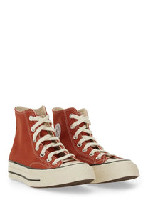 Converse unisex chuck vintage sneaker red with red canvas high tops white laces and cream-colored rubber sole