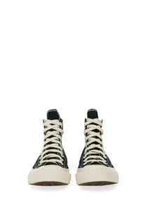 Converse unisex sneaker black high-top sneakers with white laces and cream rubber sole for casual wear