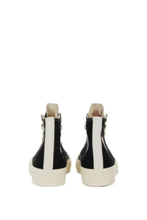 Converse unisex sneaker black high-top with white side stripes and cream rubber soles for casual wear