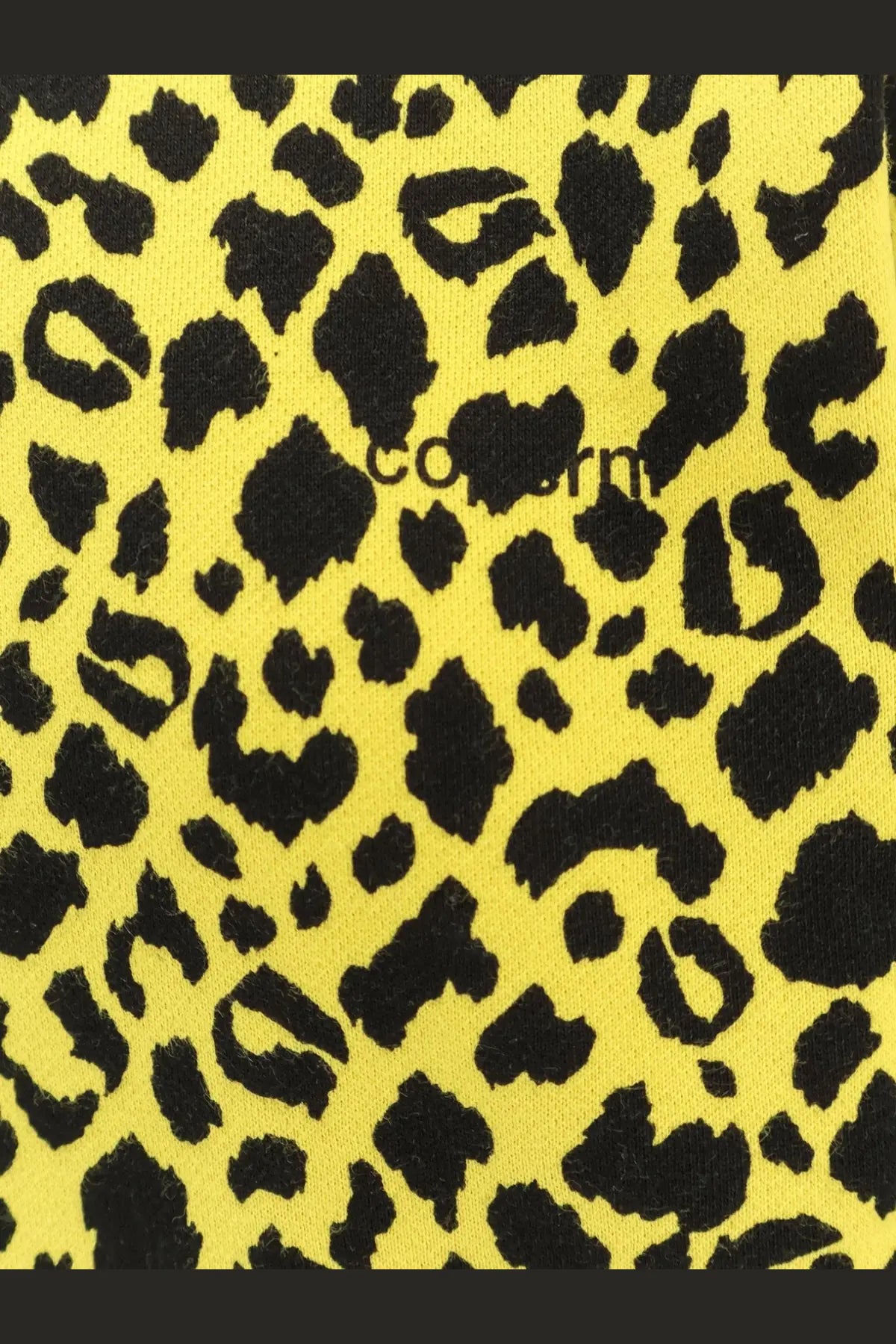 Yellow leopard print pattern on coperni men’s hooded cotton sweatshirt with bold black spots
