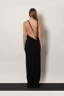 Back view of coperni women’s black stretch fabric maxi dress with spaghetti straps and deep back cutout