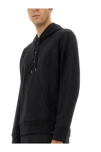 Courrèges men’s black hoodie with button closure front and kangaroo pocket in soft cotton material