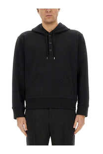 Courrèges men’s hoodie black with button closure front and kangaroo pocket in soft cotton fabric