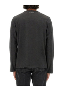 Dark gray courrèges men’s long-sleeved cotton t-shirt with subtle heathered texture and small white text at neckline