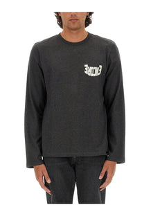 Courrèges men’s dark gray long-sleeved crewneck tee with white encore logo printed on left chest