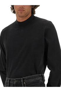 Courrèges men’s black long-sleeved turtleneck shirt with subtle chest logo in a sleek modern design