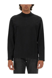 Black courrèges men’s long-sleeved turtleneck shirt with a subtle logo on the chest for stylish layering