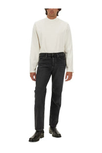 Courrèges men’s shirt white paired with dark-wash denim jeans featuring a classic five-pocket design and belt loops