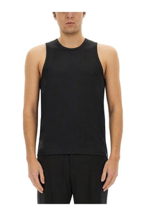 Black sleeveless Courrèges men’s athletic tank top with crew neckline and subtle chest branding in lightweight fabric