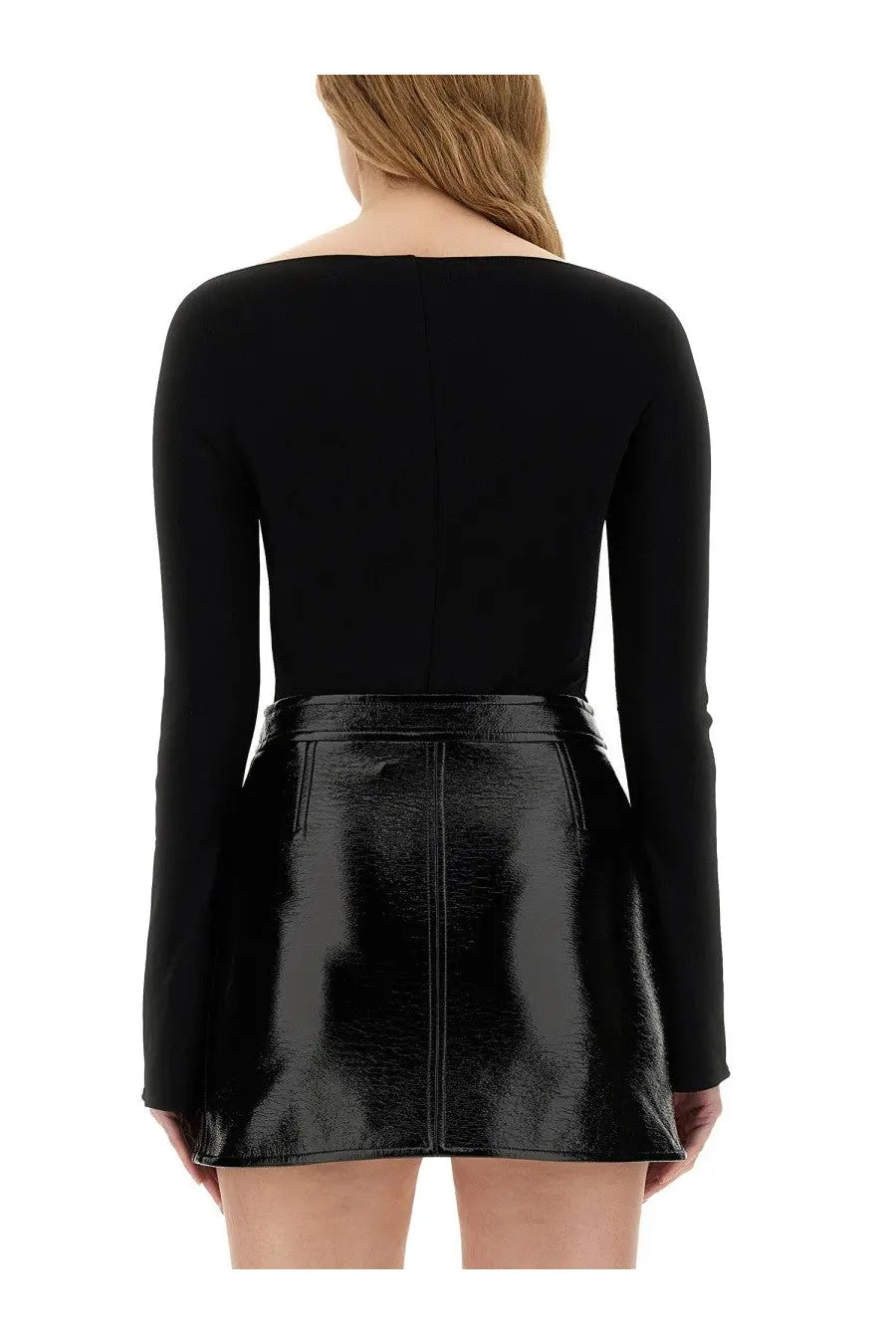 Courrèges women’s black body in jersey paired with a glossy patent leather skirt featuring a zipper and pockets
